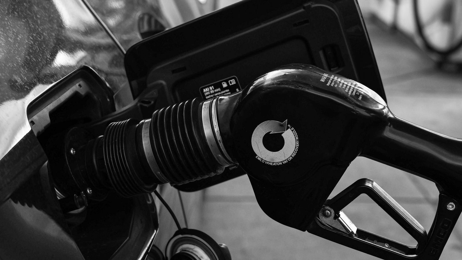 Gas pump nozzle in a car filler neck